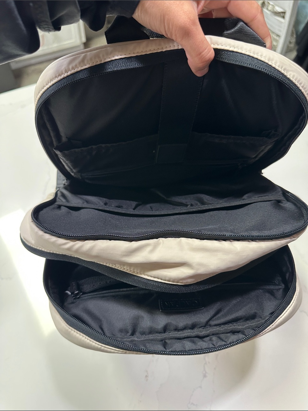 Calpak Light Beige Padded Backpack with Black Accents. Travel Backpack - Picture 7 of 11